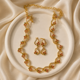 Regal CZ & Ruby-Tone Curved Paisley Necklace with Matching Earrings